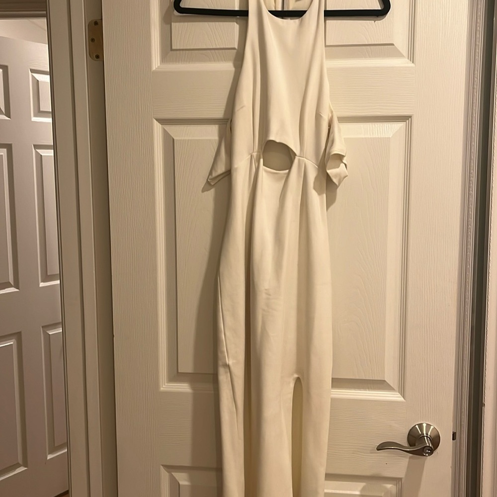 Gorgeous white dress. Open zipper back. Front slit.